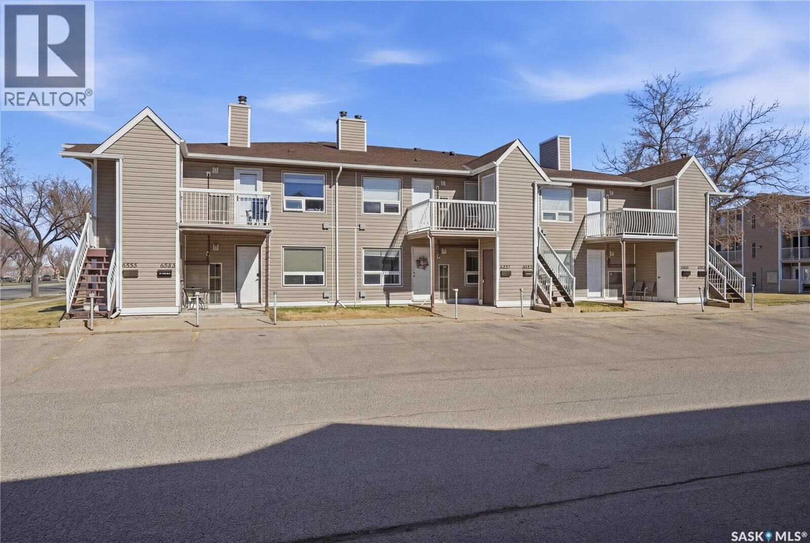 Property Photo:  6549 Rochdale Boulevard  SK S4X 2Z1 