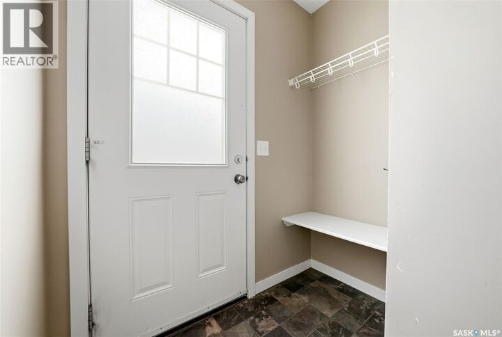Property Photo:  102 5051 James Hill Road  SK S4W 0B9 