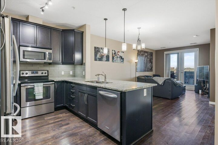 Property Photo:  6083 Maynard Way NW 217  AB T6R 0S5 
