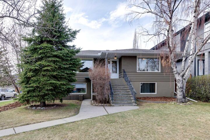 Property Photo:  403 30 Avenue NW  AB T2M 2N5 