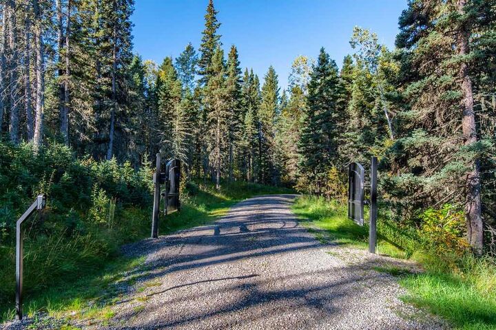 Property Photo:  272121 Coalmine Road W  AB T0L 1W4 
