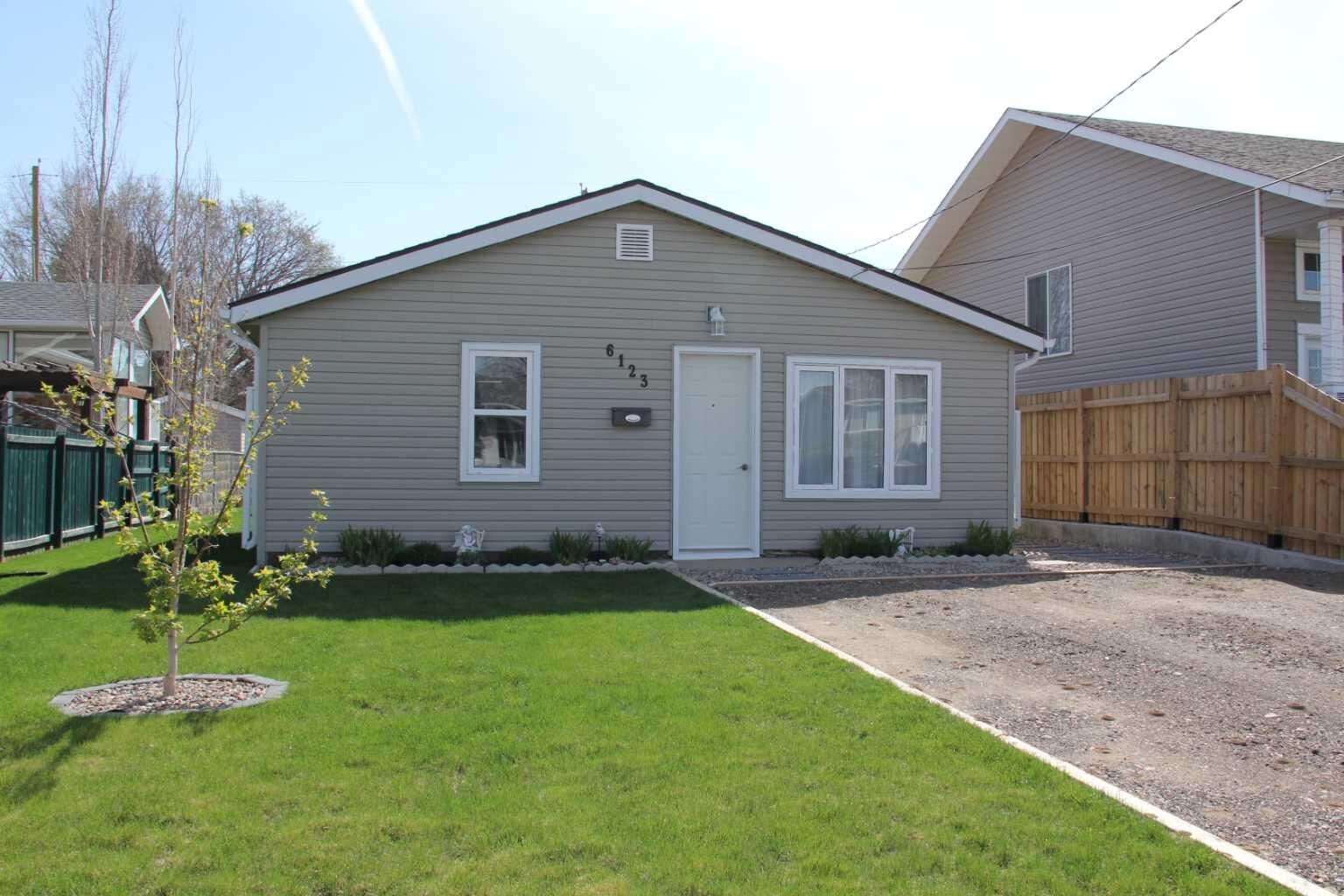 Property Photo:  6123 54 Street  AB T1G 1J9 