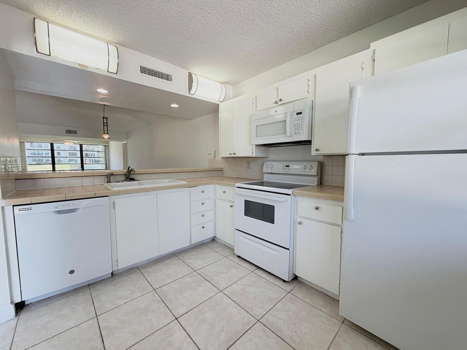 Property Photo:  3511 Village Boulevard Unit 103  FL 33409 