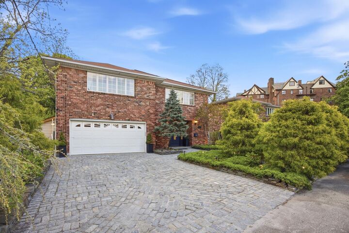 Property Photo: 234-11 38th Drive NY 11363