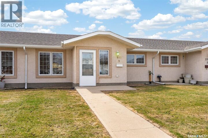 Property Photo:  2 257 Fairford Street W  SK S6H 1V5 
