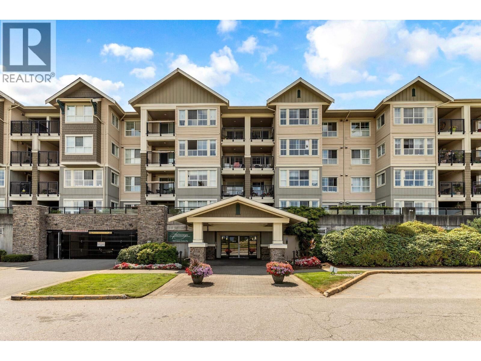 Property Photo:  19673 Meadow Gardens Way 433  BC V3Y 0A1 