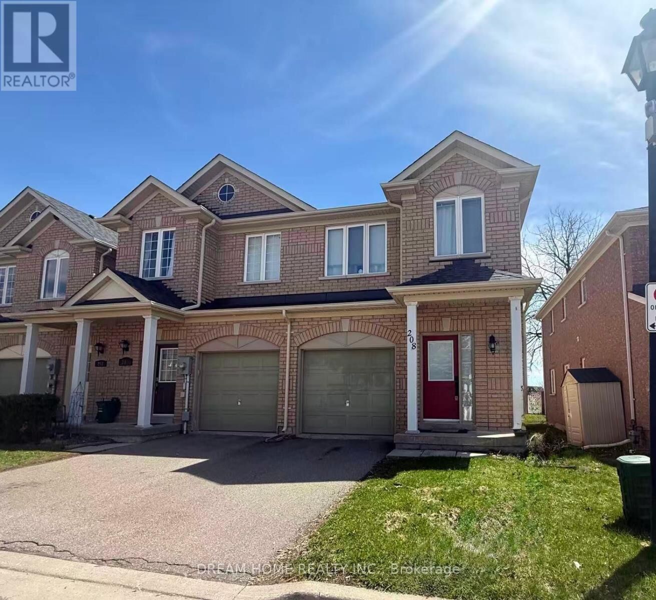 Property Photo:  208 Tom Taylor Crescent  ON L3X 3E8 