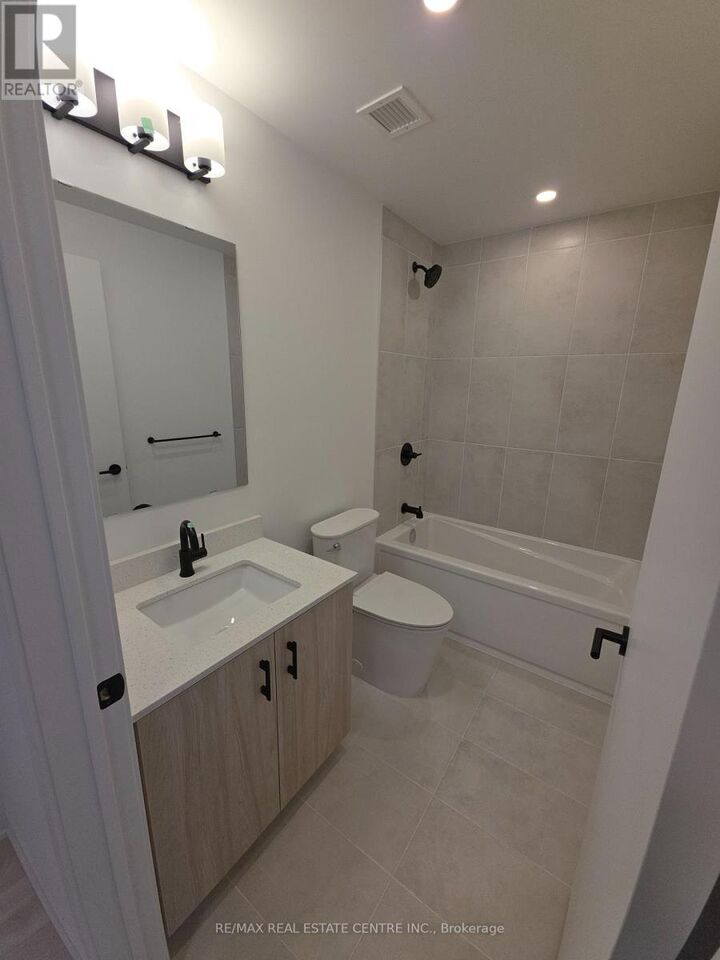 Property Photo:  4878 Powers Common 119  ON L7M 0W7 