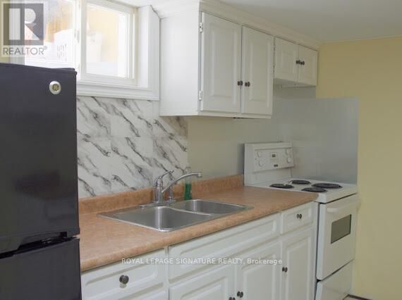 Property Photo:  60 Newlands Avenue Bsmt  ON M1L 1R9 