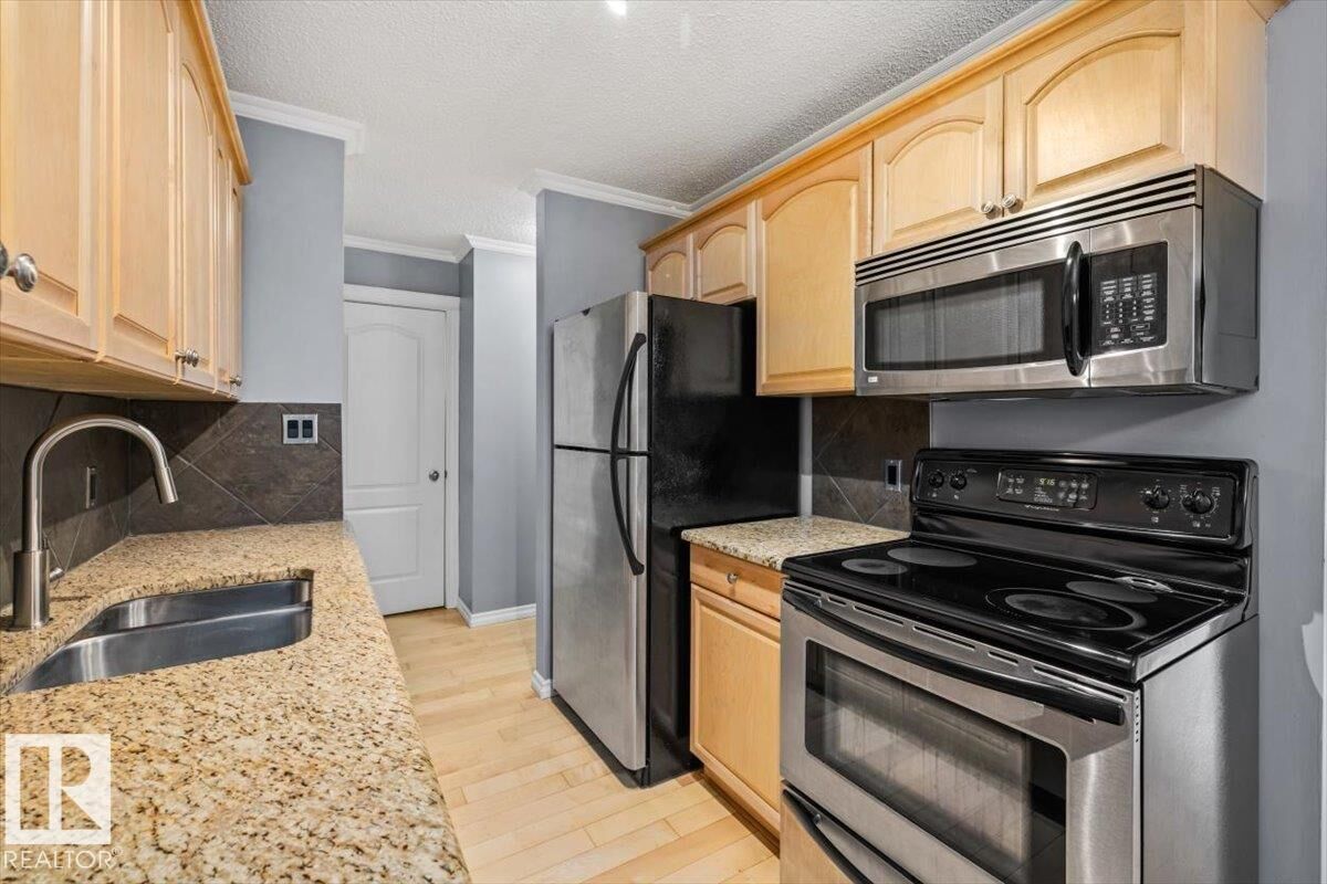 Property Photo:  10547 83 Avenue NW 201  AB T6E 2E1 