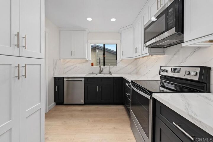 Property Photo:  5975 Gaines Street  CA 92110 