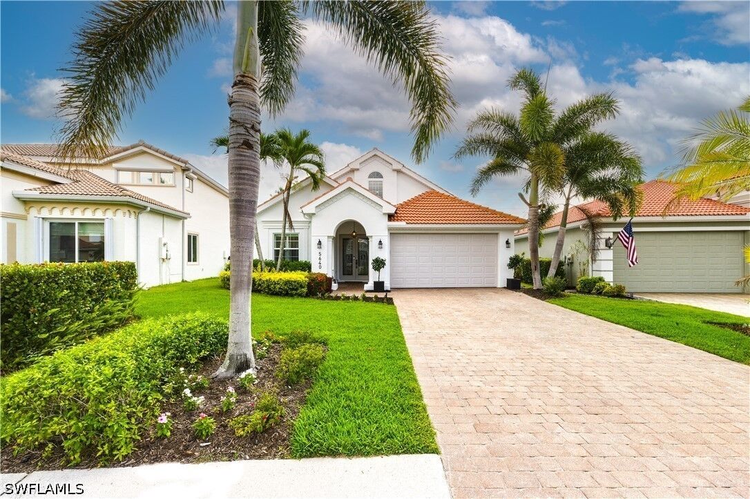 Property Photo:  5640 Lago Villaggio Way  FL 34104 