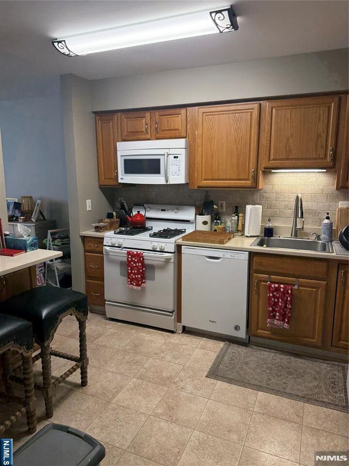 Property Photo:  215 Orchard Pk 215  NJ 07401 