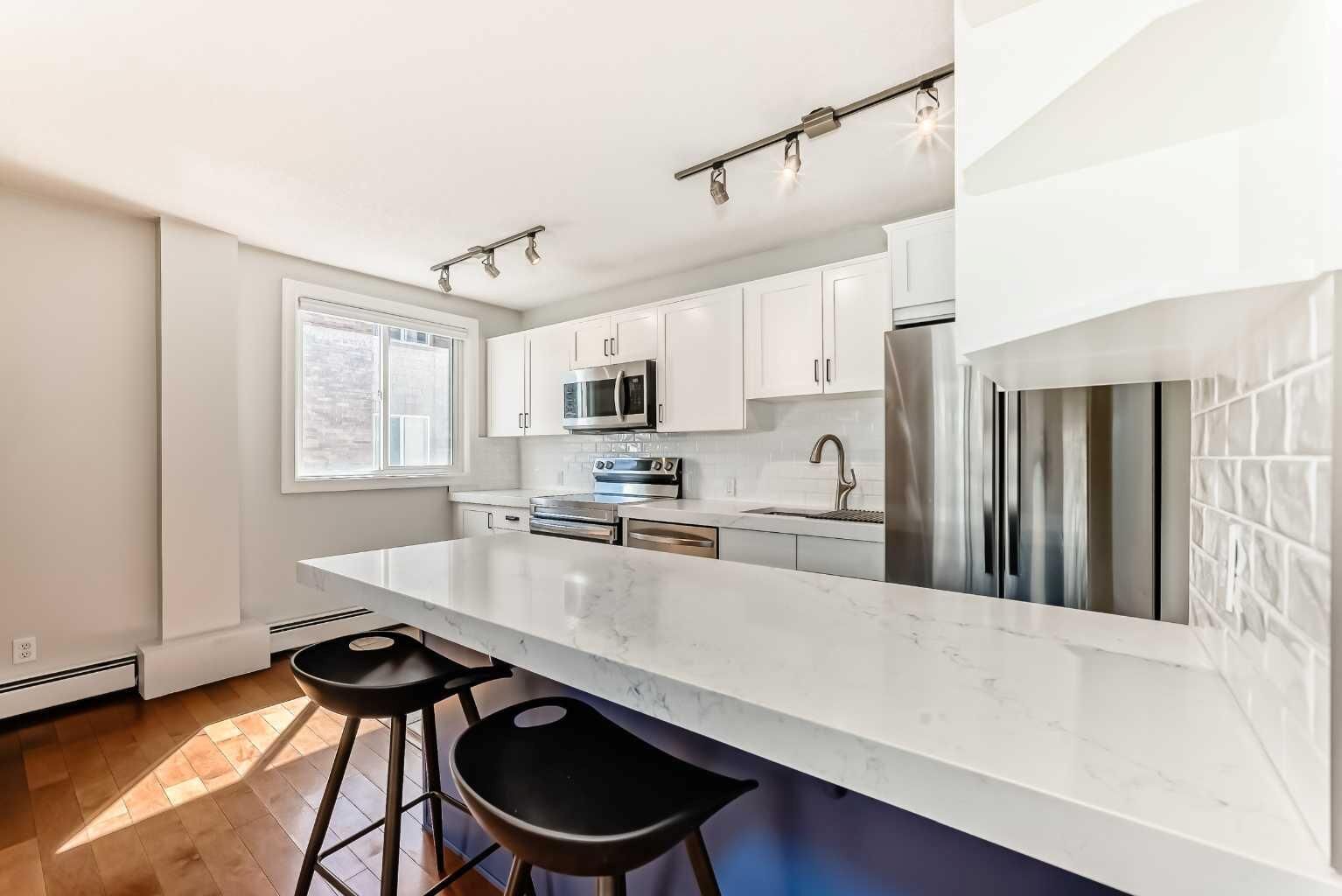 Property Photo:  835 18 Avenue SW 303  AB T2T 0G9 