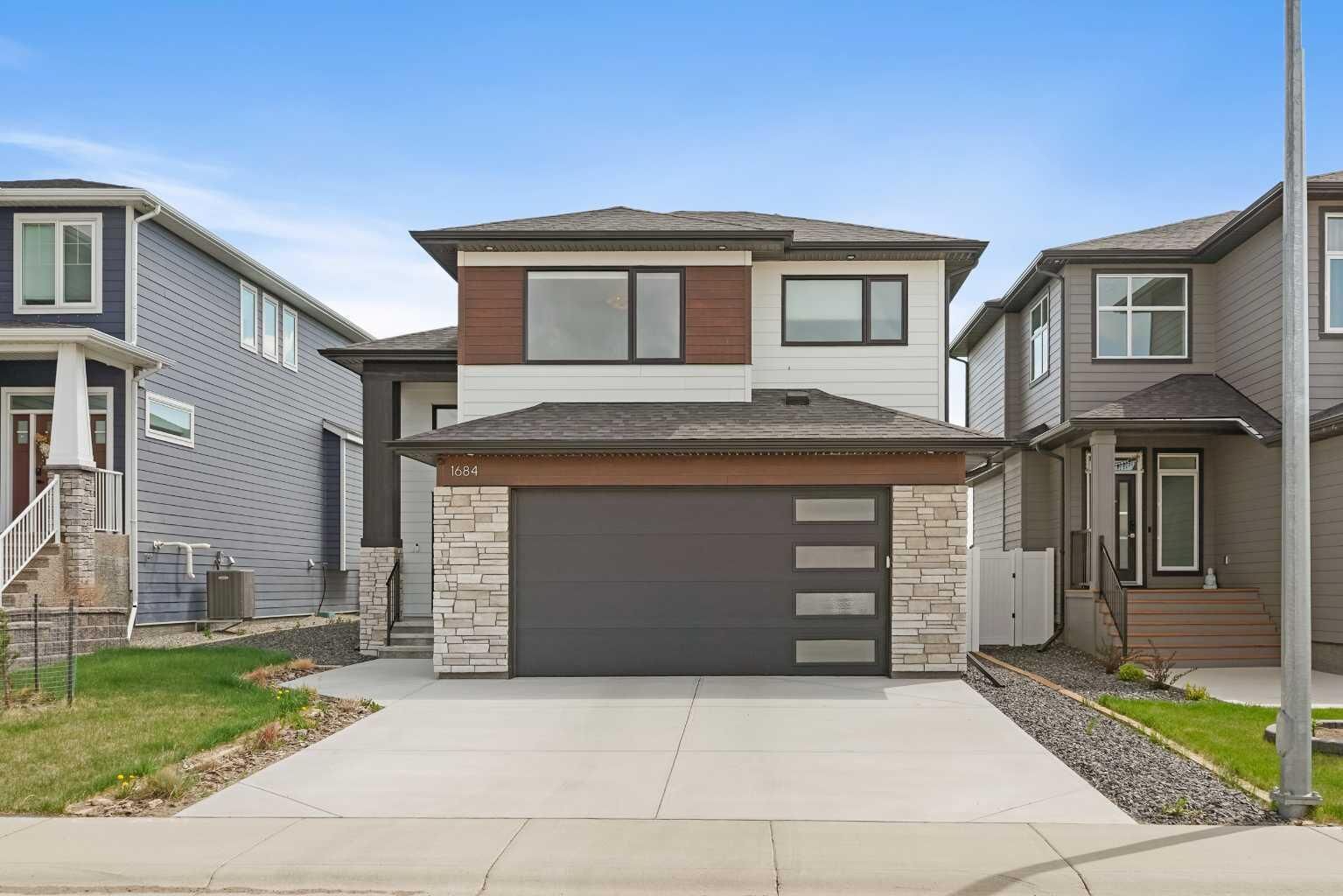 Property Photo:  1684 Sixmile View S  AB T1K 8J2 