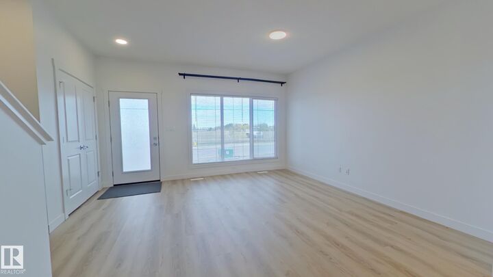 Property Photo:  1037 Aster Boulevard NW Main  AB T6T 1J1 