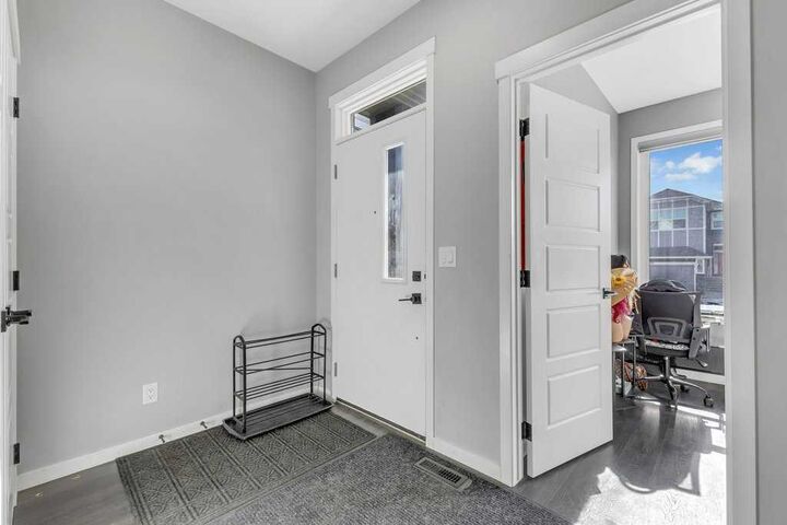 Property Photo: 120 Belmont Villas SW AB T2X 4W5