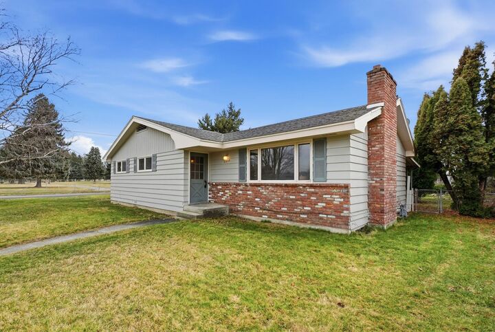 Property Photo:  11822 E 15th Ave  WA 99206 