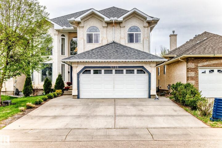 Property Photo: 6736 11 Avenue SW AB T6X 1L1