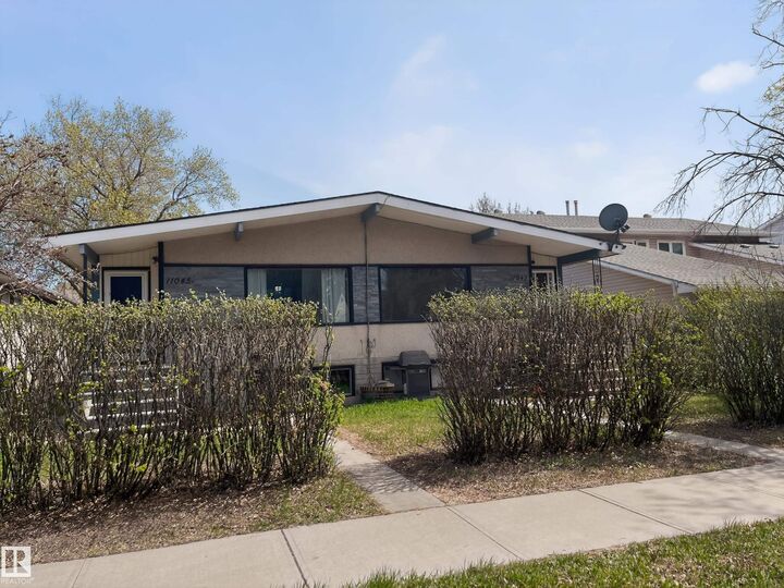 Property Photo: 11043 / 11045 131 Street NW AB T5M 1B9