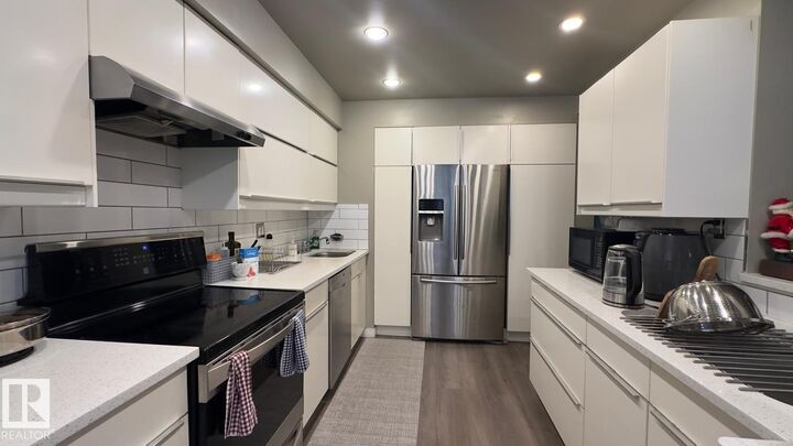 Property Photo:  13417 40 Street NW  AB T5A 3L9 