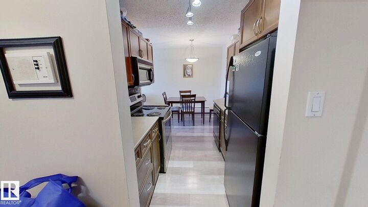 Property Photo:  10326 117 Street NW 401  AB T5K 1X8 