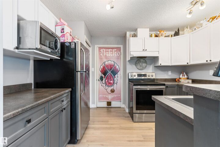 Property Photo:  3040 Spence Wynd SW 73  AB T6X 1N7 