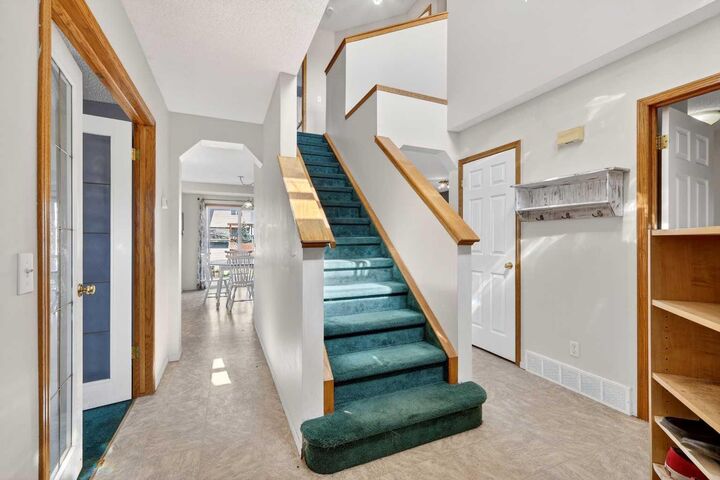 Property Photo:  100 Tuscany Way NW  AB T3L 2A4 