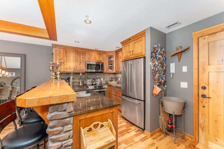 Property Photo:  101B Stewart Creek Landing 2207  AB T1W 0E3 