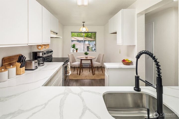 Property Photo:  170  Newport Way NW D31  WA 98027 