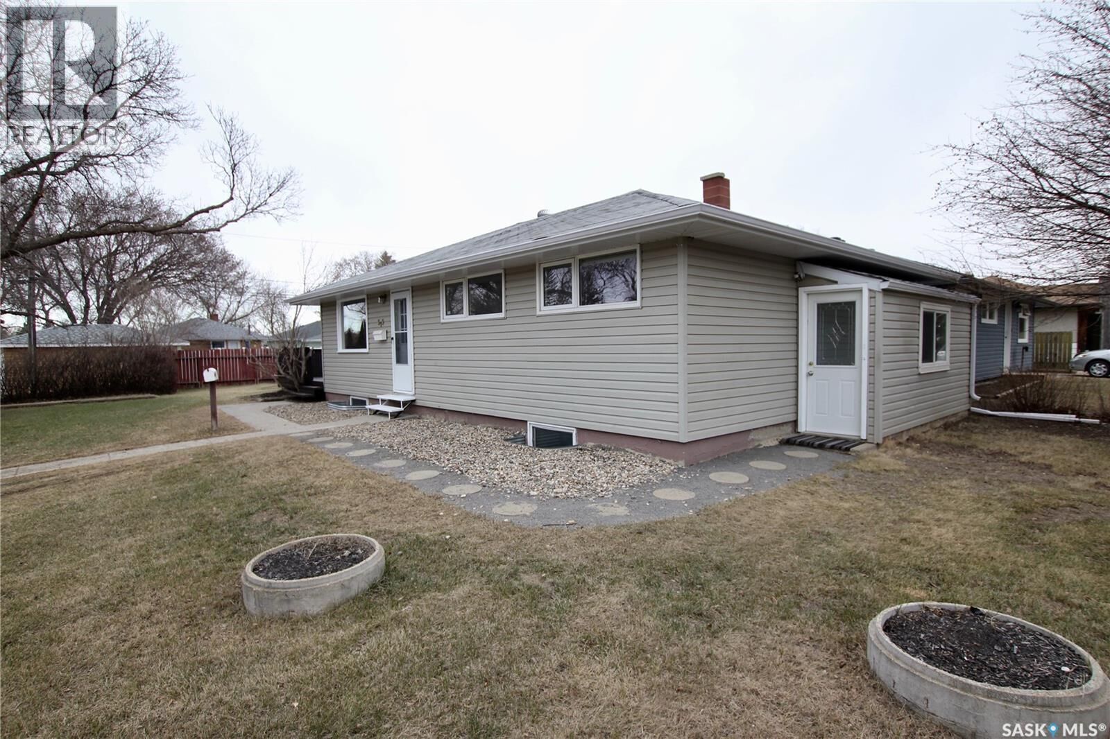 Property Photo:  303 Royal Street  SK S4R 4Y2 