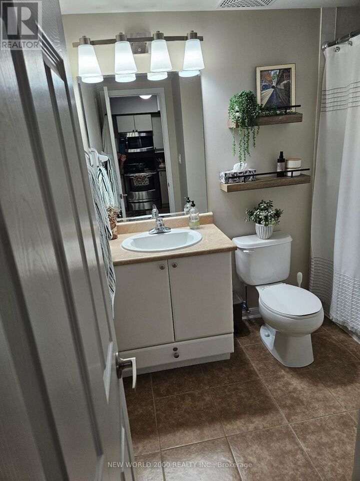 Property Photo:  3070 Rotary Way 428  ON L7M 0H1 