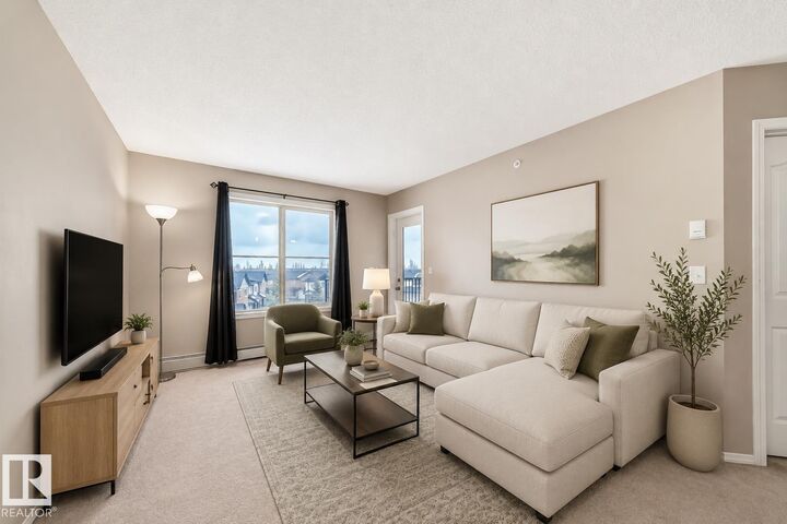 Property Photo:  12025 22 Avenue SW 404  AB T6W 2Y1 