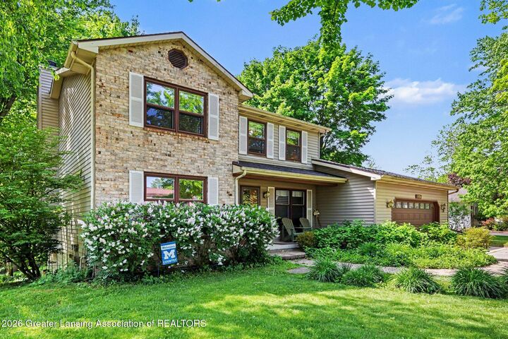 Property Photo:  5836 Wood Valley Drive  MI 48840 