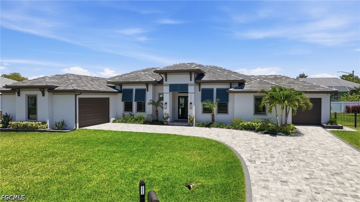 Property Photo: 4009 SW 25th Place FL 33914