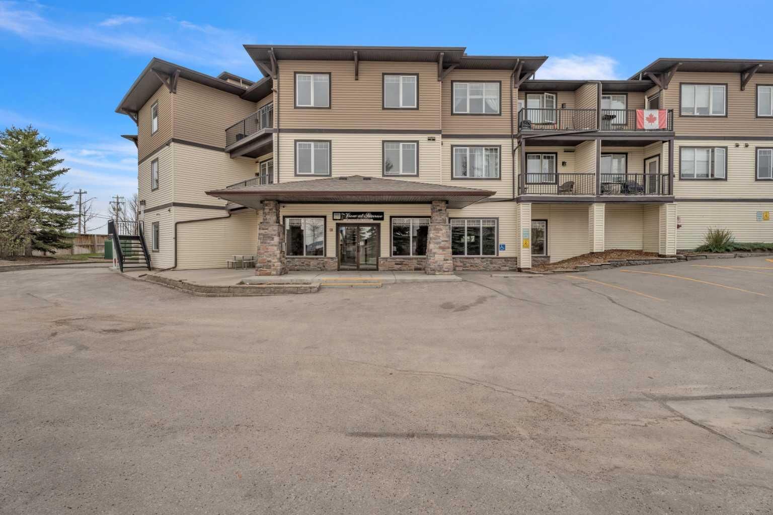 Property Photo:  43 Sunrise Loop SE 215  AB T1V 0A8 