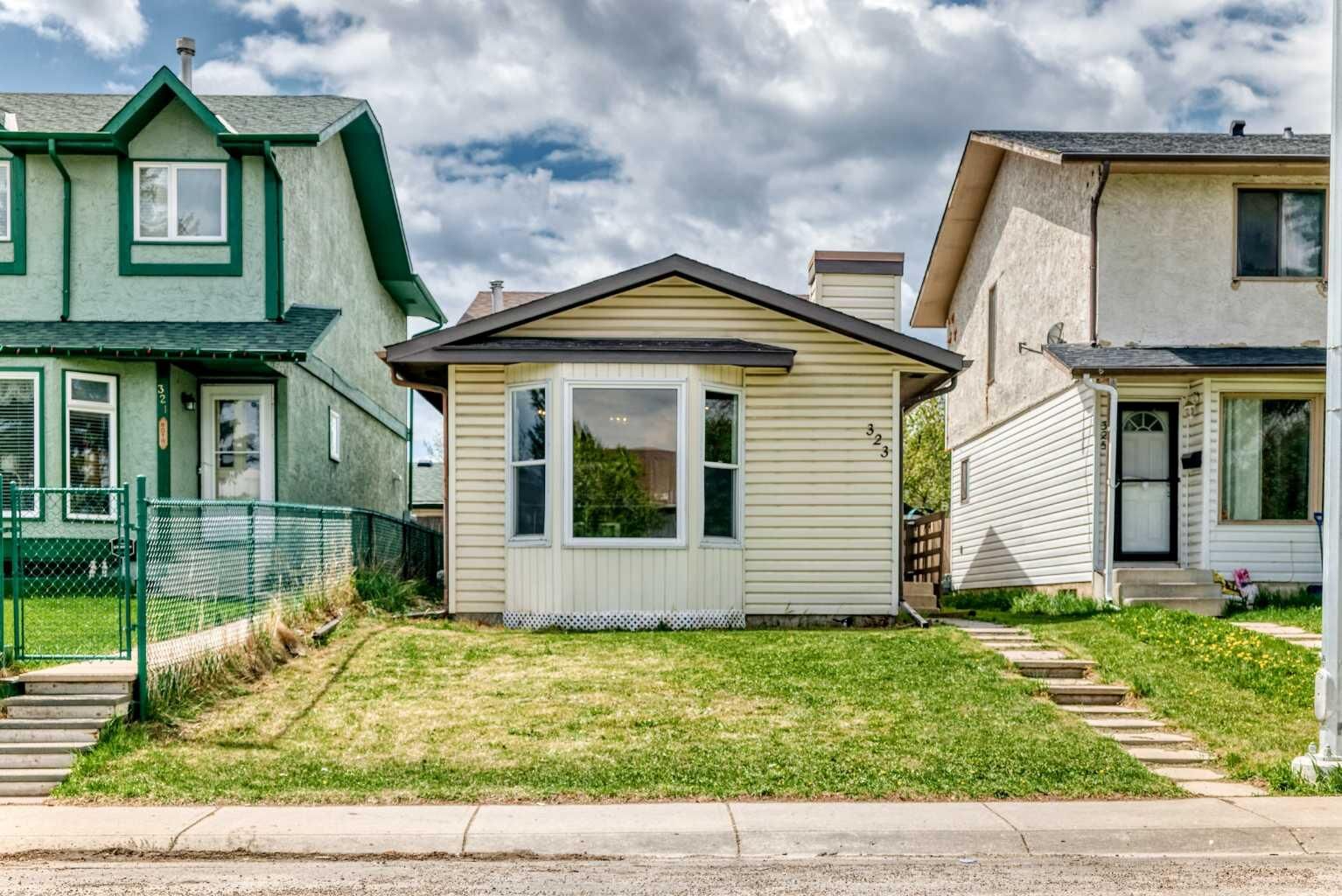 Property Photo:  323 Falwood Way NE  AB T3J 1A9 