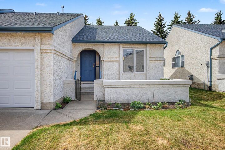 Property Photo: 9718 176 Street NW 12 AB T6L 1W3