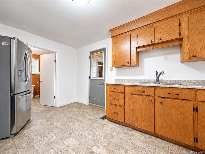 Property Photo:  37 St-Jean Baptiste Street  NB E4S 3W1 