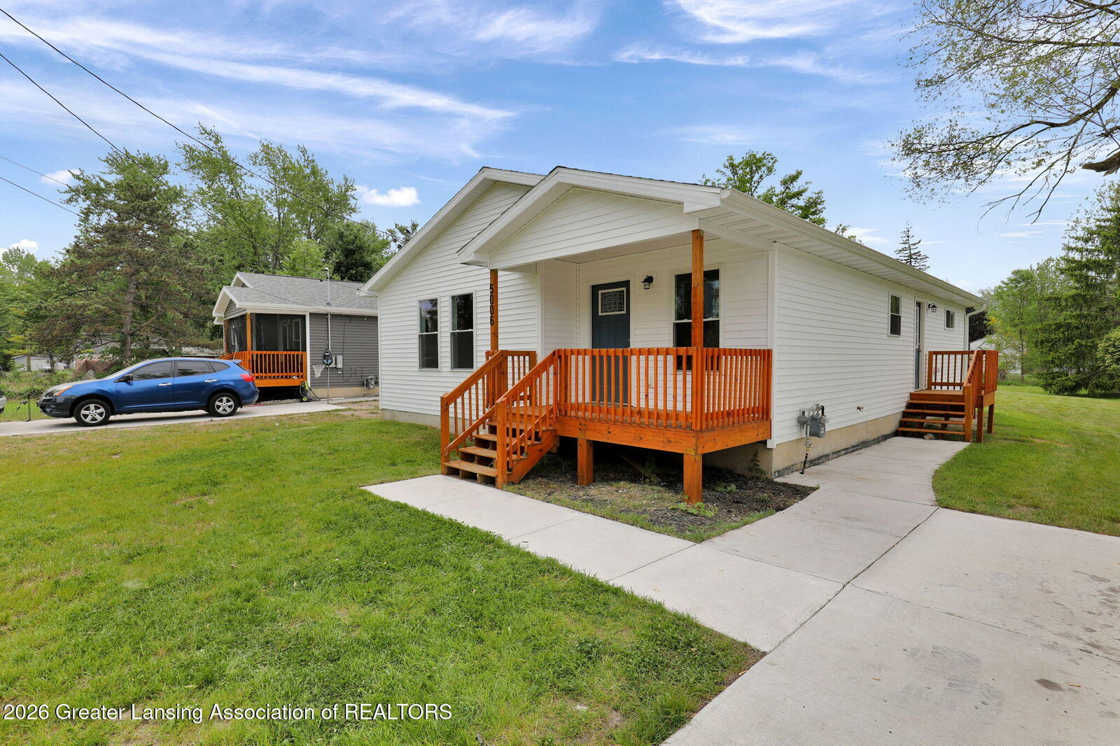 Property Photo:  5006 Christiansen Road  MI 48910 