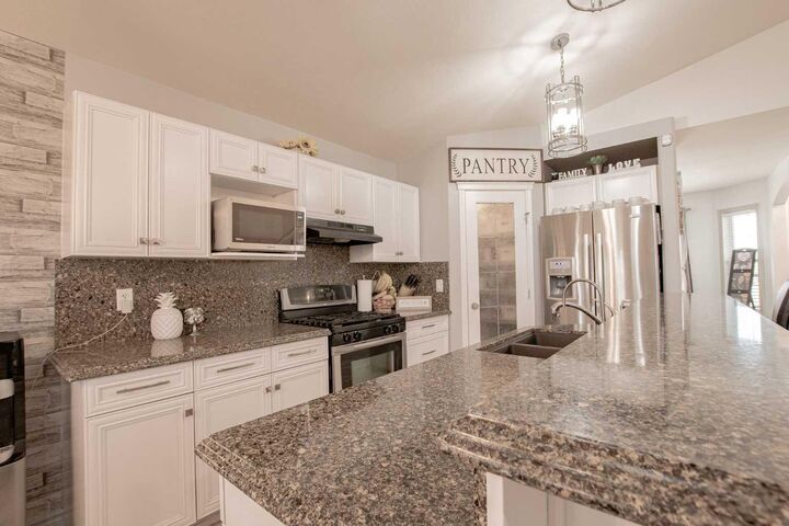 Property Photo:  7110 90 Street  AB T8X 0E1 