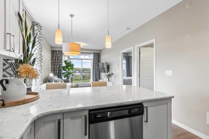 Property Photo: 6603 New Brighton Avenue SE 412 AB T2Z 5E5