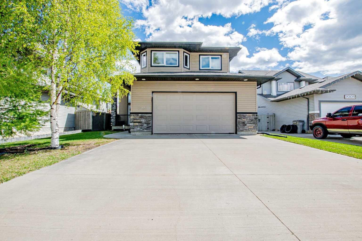 Property Photo:  7013 115 Street  AB T8W 0E8 