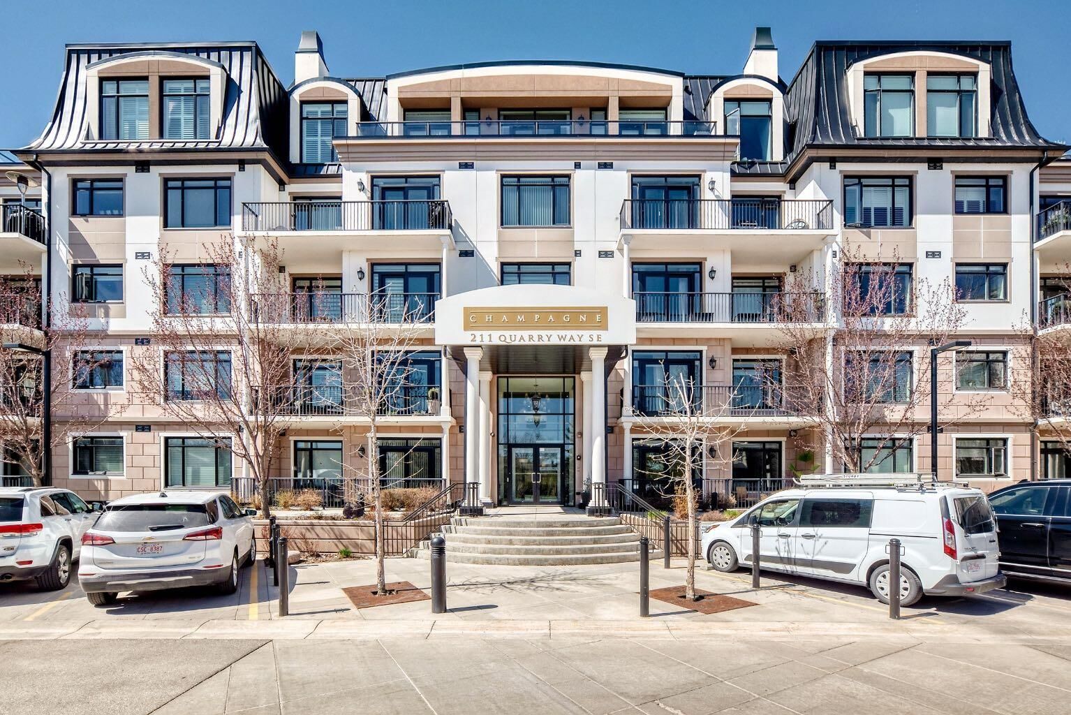 Property Photo: 211 Quarry Way SE 404 AB T2C 5M6