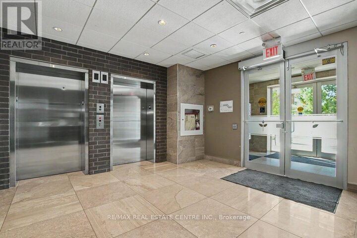 Property Photo:  33 Whitmer Street 214  ON L9T 8P9 