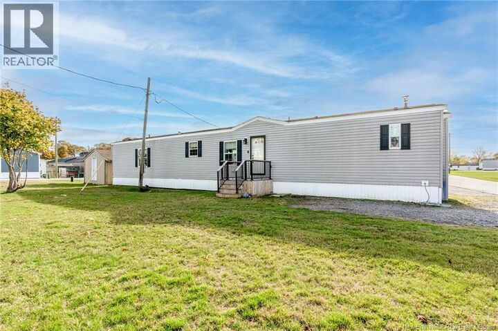 Property Photo:  3 Daisy Street  NB E2M 5M9 