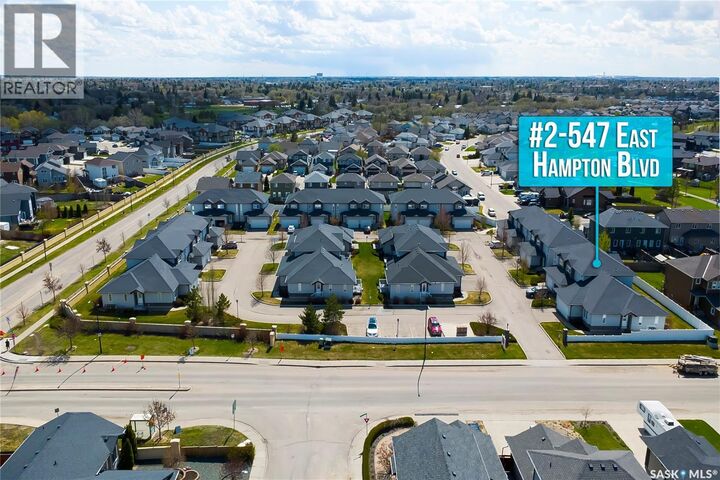 Property Photo:  2 547 East Hampton Boulevard  SK S7R 0B1 