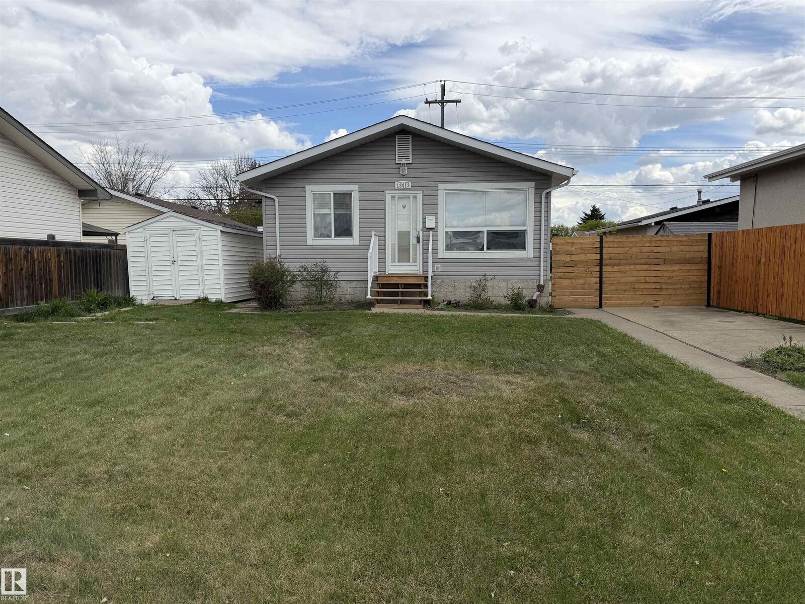 Property Photo:  13413 59 Street NW  AB T5A 0S1 