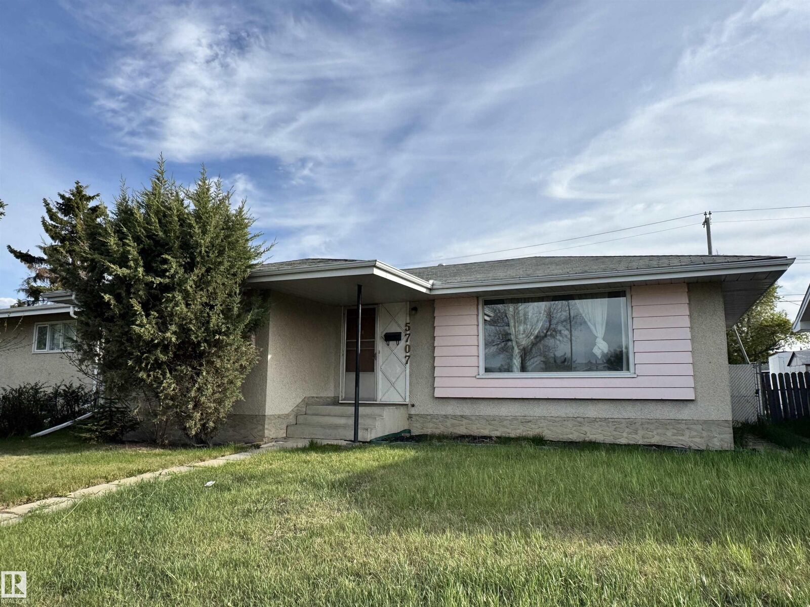 Property Photo:  5707 90 Avenue NW  AB T6B 0P1 