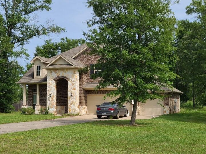Property Photo: 9155 White Tail Drive TX 77303